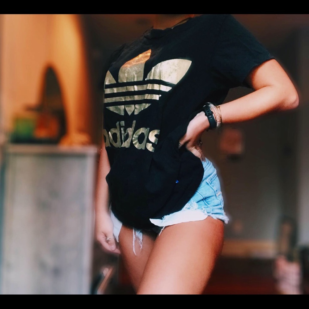 Adidas back and gold shirt